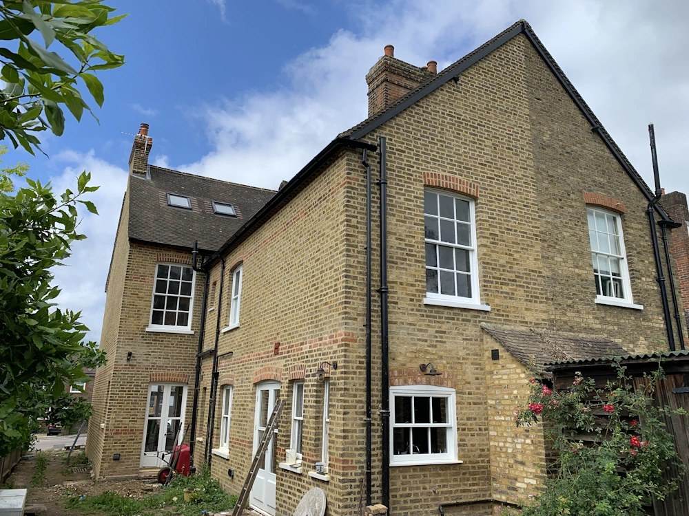 Before and after lime mortar repointing